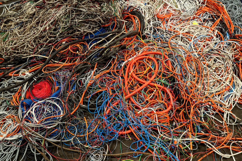 Old copper cables at a scrap facility. Photographer: Brendon Thorne/Bloomberg